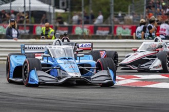 INDYCAR Series driver, DEVLIN DeFRANCESCO (29) of Toronto, Canada, races through the turns during