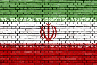Flag of Iran painted on brick wall