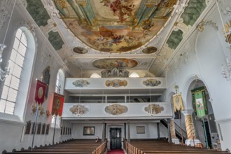 Organ loft and ceiling frescoes, St George and Florian is a listed Catholic parish church in