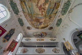 Organ loft and ceiling frescoes, St George and Florian is a listed Catholic parish church in