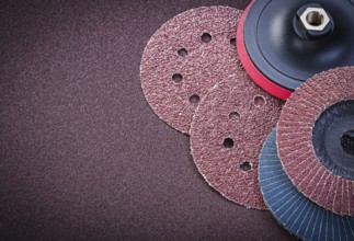 Sanding discs holder on polishing sheet abrasive materials