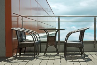 Table with two chairs on terrace