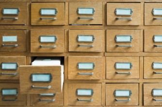Old archive with wooden drawers