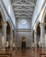 Orvieto, Italy, 18 November, 2023: interior view of the Orvieto Cathedral central nave with pews