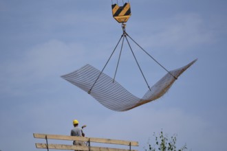 Craftsmen on a large construction site