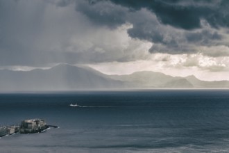 Amazing aerial filtered view of the Gulf of Naples. Fortress Castel del Ovo at the bottom left