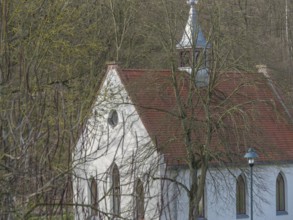 Small church surrounded by trees. Cloudy sky in the background, grimma, dresden, germany