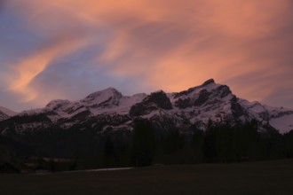Sky on fire, sunrise scene in Gsteig near Gstaad