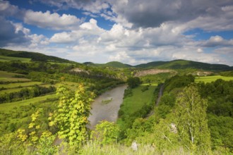 View from the hill into the valley with the Berounka river. Berounka river, limestone rocks,