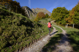 Solitary woman walking on the Arlet route, Camille path, pyrenees national park, pyrenees