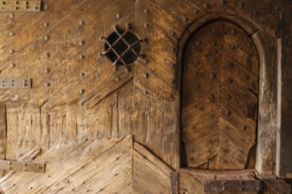 Castle gate with medieval wooden door