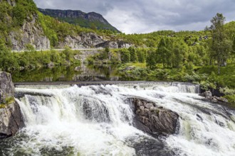 Magnificent seething waterfall - threshold on the river Bioreio. The river flows in western Norway.