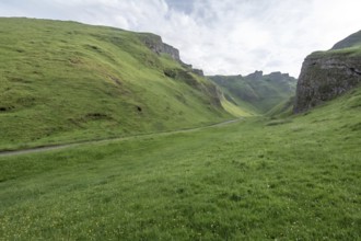 Winnats pass is a hill pass and limestone valley in the peak district of derbyshire, England,