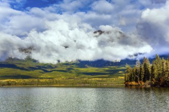 The lake is covered with light water ripples. Pyramid Lake. Cold sunny day in the Rocky Mountains