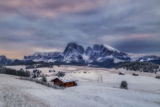 Snowy Alpe di Siusi, Seiser Alm, Sassolungo a Sassoplatto before sunrise