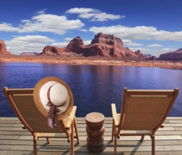 Walk to the tourist boat on Lake Powell on the Colorado River. At the stern of the vessel are two