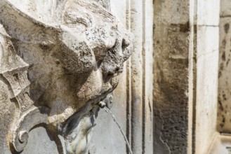 Detail of an ancient fountain in Spoleto Italy