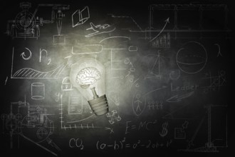 Bulb Illuminates mathematics and business icons on the school chalk board. 3d illustration