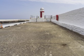 The pier and small lighthouses in Laxey, Garff, Isle of Man