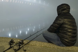 Night Fishing Urban Edition. Fisherman in Foggy night. Night Fishing, Carp Rods, Night reflection.