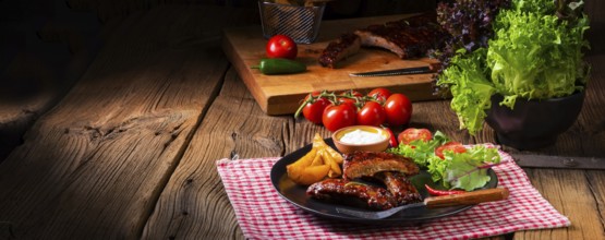 Delicious grilled ribs with barbecue sauce