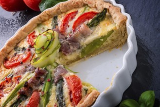 Green asparagi Tart with eggs and tomato