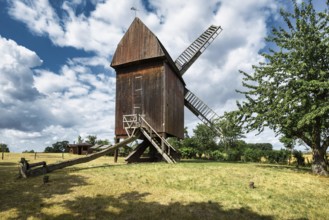 A view of a beautiful windmill in Germany in a natural setting and an eye catcher for tourists