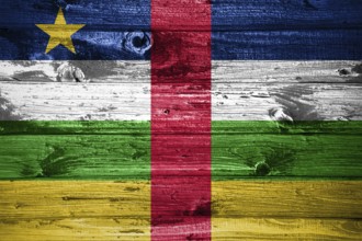 Central African Republic flag on wooden planks background wood flag