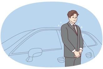 Car driver in suit standing near car waiting for client. Chauffeur in formalwear working in luxury
