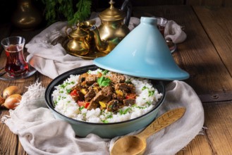 Tajin beef stew with rice, peppers and sesame seeds