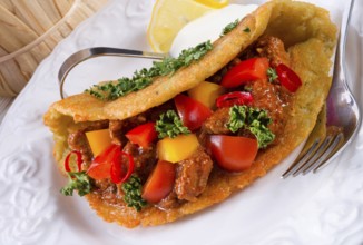 Hungarian goulash with potato pancake