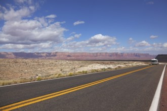 The tourist bus on road to desert. California