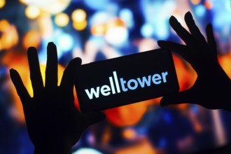 In this photo illustration, the Welltower logo is displayed on a smartphone mobile screen