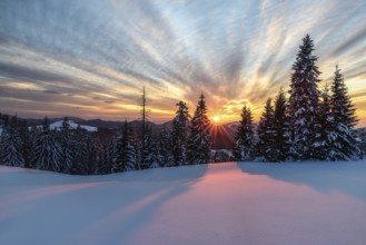 Wonderful sunset with snow and beautiful clouds in Slovakia