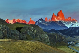 The grand crimson dawn over the mountain range Fitzroy. Mountain peak in Patagonia in the border