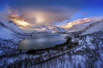 Beautiful winter landscape scene, sunset or sunrise in mountains and fjords