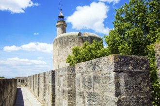 Antique walls of the medieval port city of Aigues-Mortes. The historic tower of Constance.