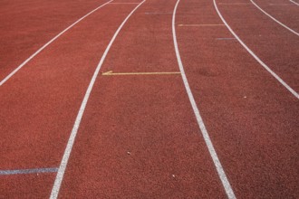 Wet synthetic track in the athletics stadium