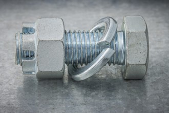 Mounted Screw Bolt And Nut With Washer Engraver On Metal Steel Plate