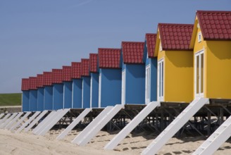 Colored blue and yellow houses on the beach