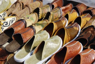A lot of various Mongolian leather slippers for sale