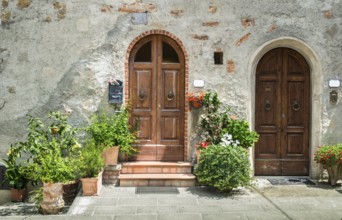 Vintage italian houses with flowers. Sun light