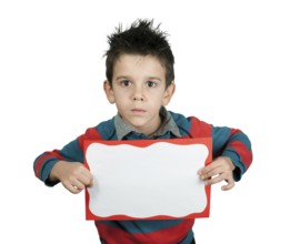 Boy with serious look who holds white board. White copy spice