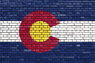 Flag of Colorado painted on brick wall