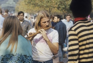 USA december 1968. Students at University of California Berkeley seen playing music and hanging out