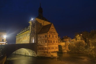 Obere bridge (brücke) and Altes Rathaus at night in Bamberg, Germany