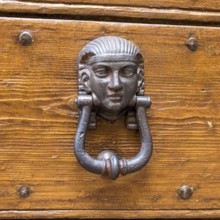 Close up of rustic old door in Spoleto, Italy