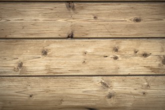 Background characterized by wooden planks rustic and warm hues