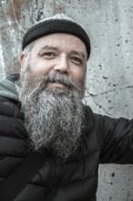 An image of a bearded man outdoor cold weather