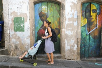 Tourist walking in the colorful historic district of Pelourinho, Bahia, Brazil. Historic